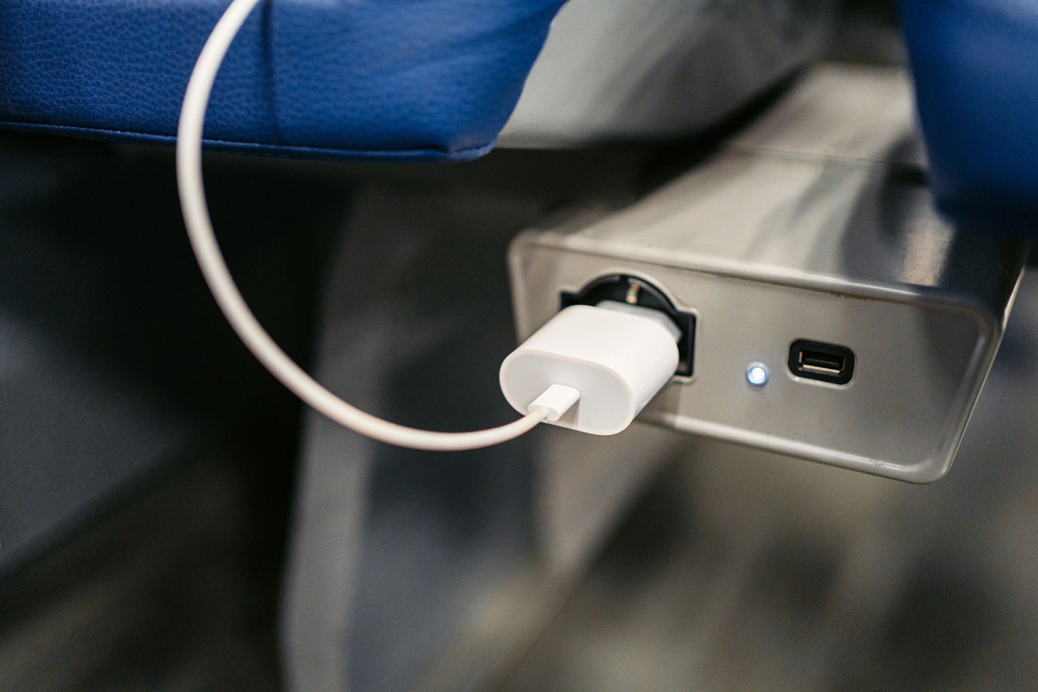 Close-up of a charging cable connected to a device