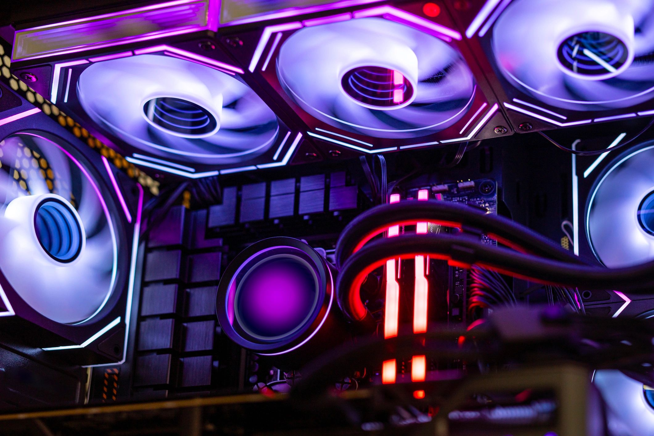 RGB-lit PC interior with RAM and cooling components