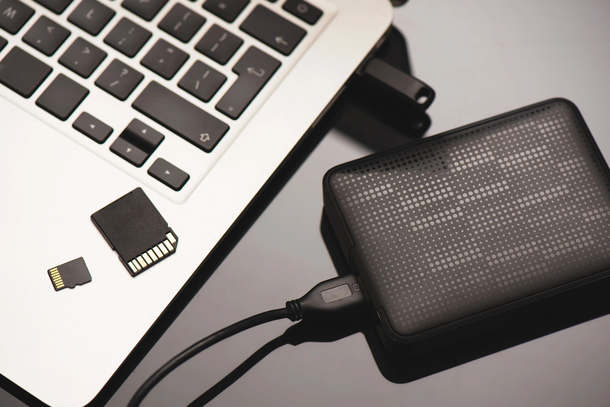 Multiple storage devices including USB drive and memory cards