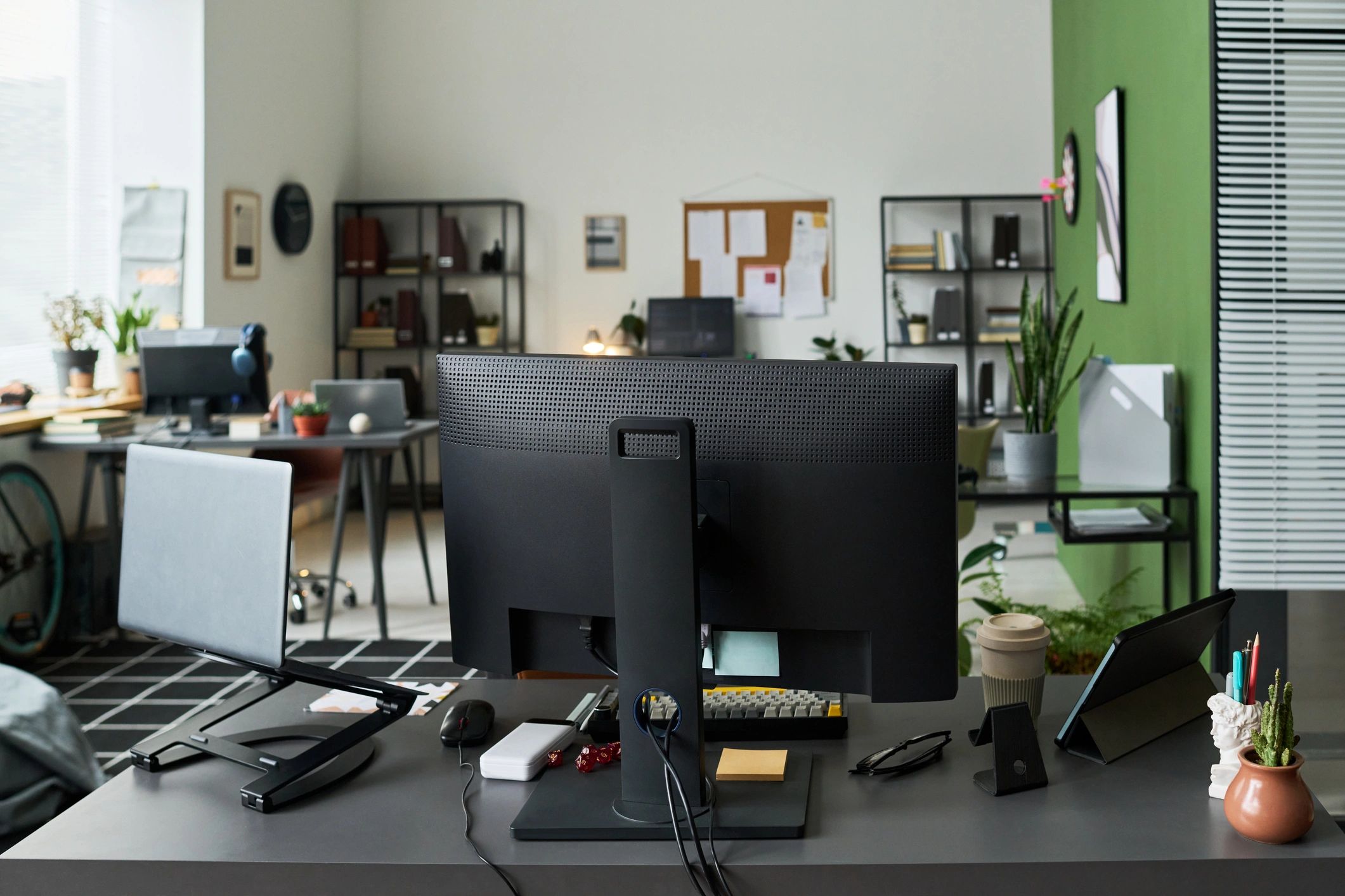 Modern workspace with laptop and desktop accessories