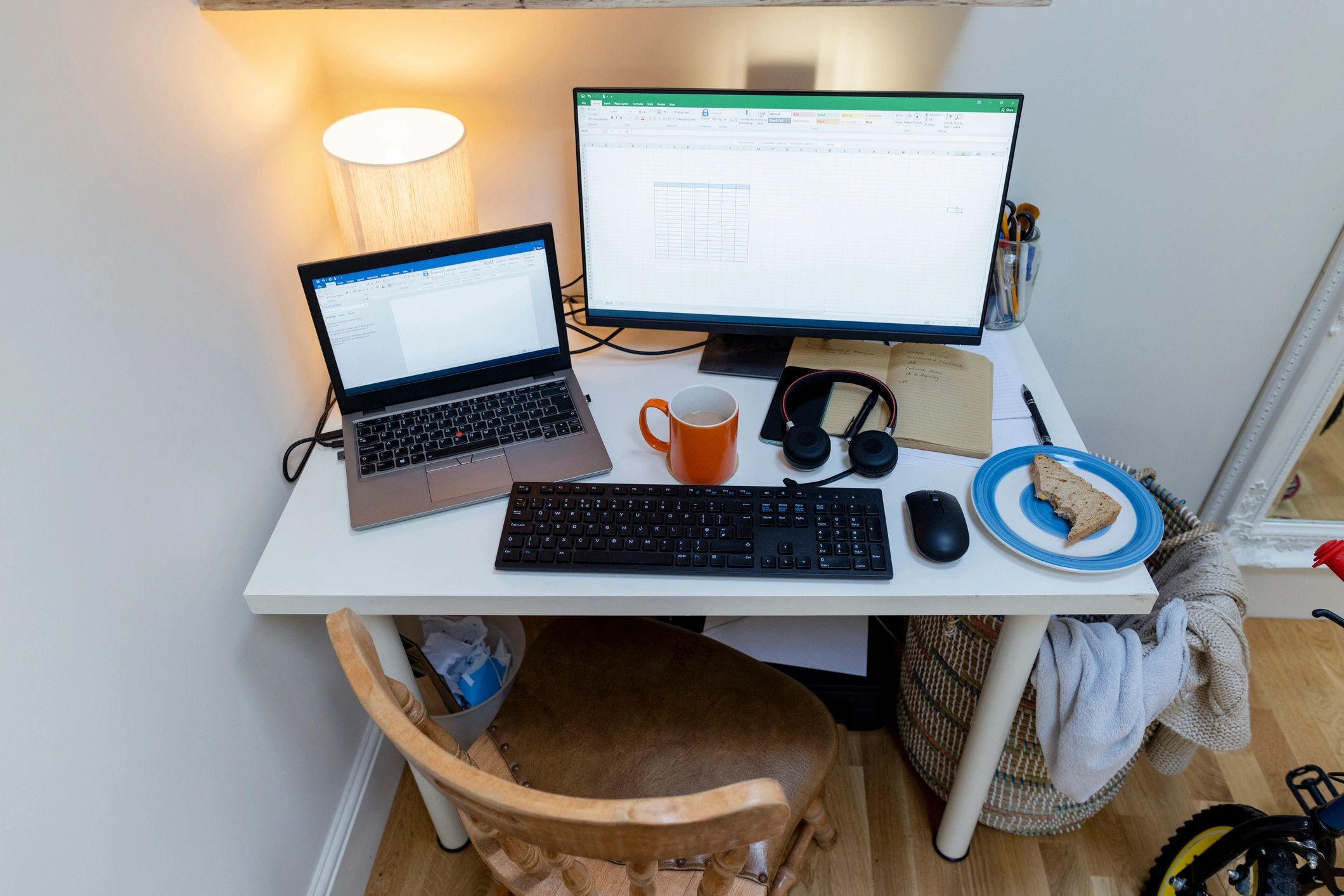Clean desk setup with computer and tech accessories